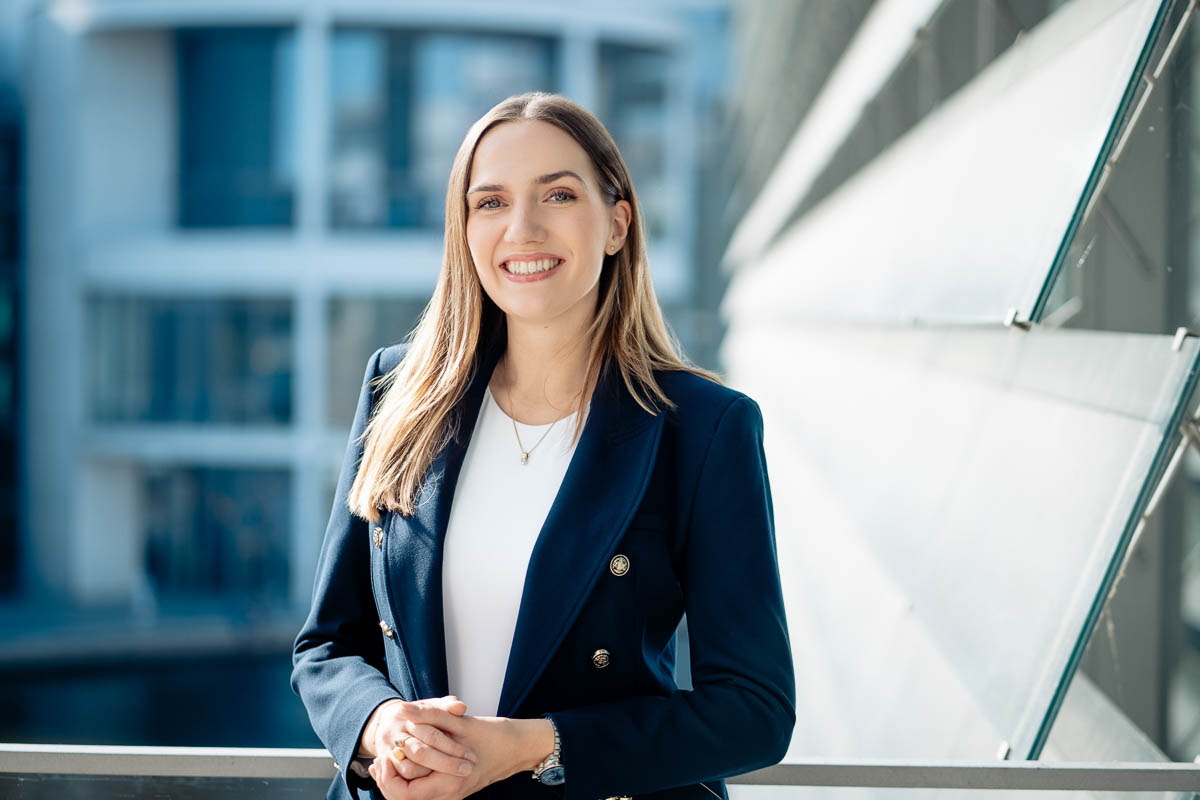 a woman smiling at camera