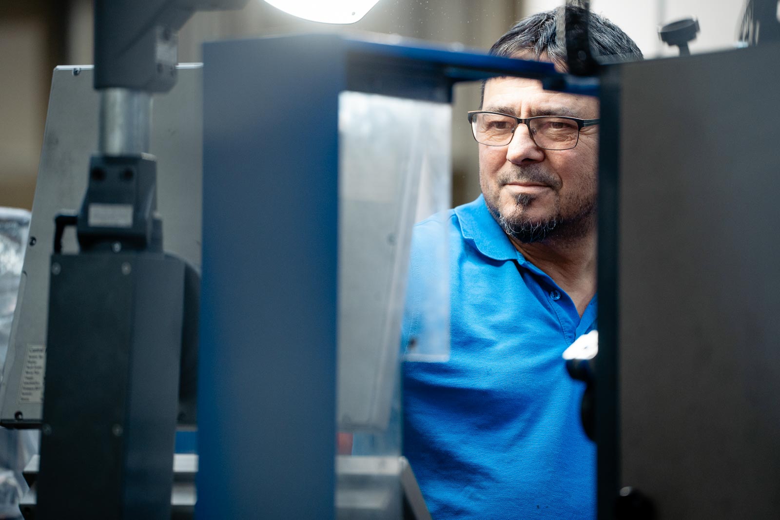 a man in a blue shirt