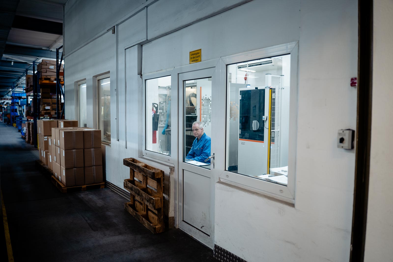 a man sitting in a window